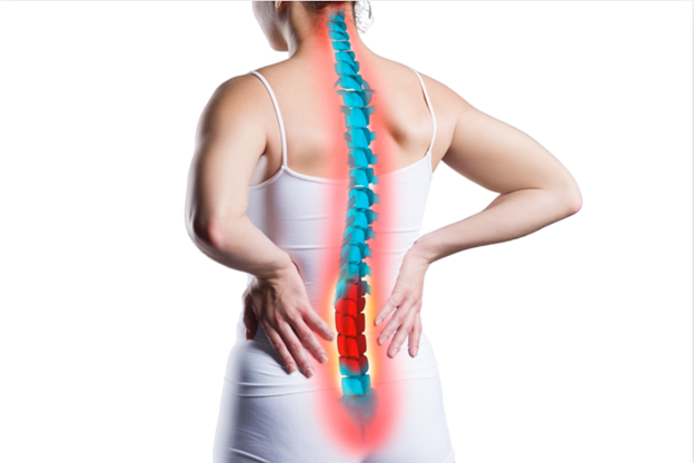 The image shows a person from behind wearing a white tank top, with a red and blue graphic on their back, possibly indicating an area of pain or injury, standing against a plain background.